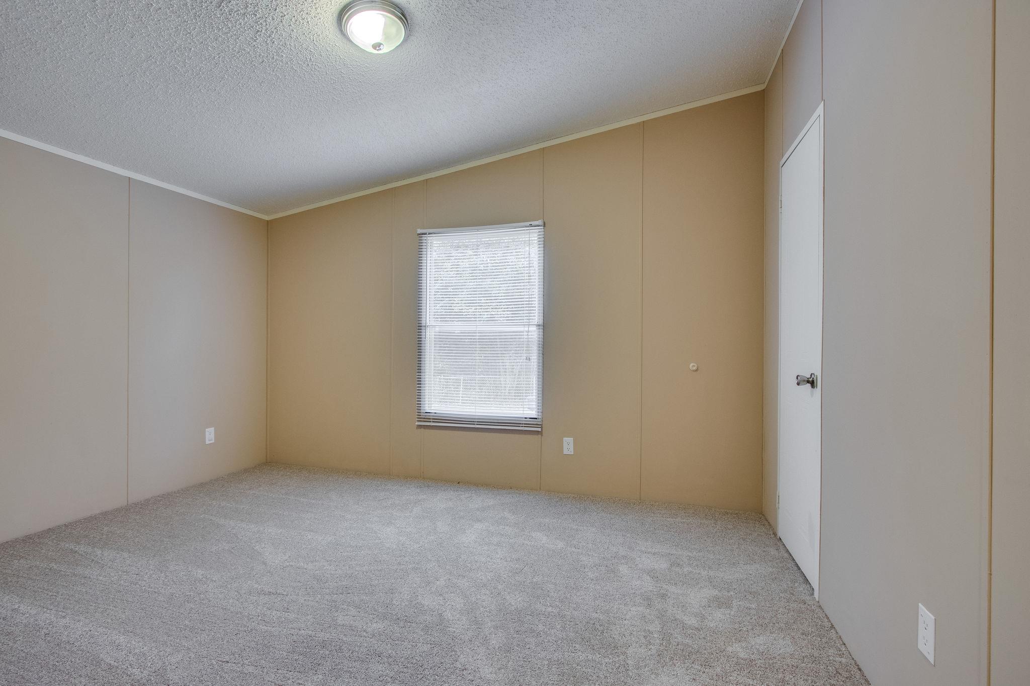 624 Speck Road Lebanon, TN 37087 - Photo 8 of 30 an empty room with a window