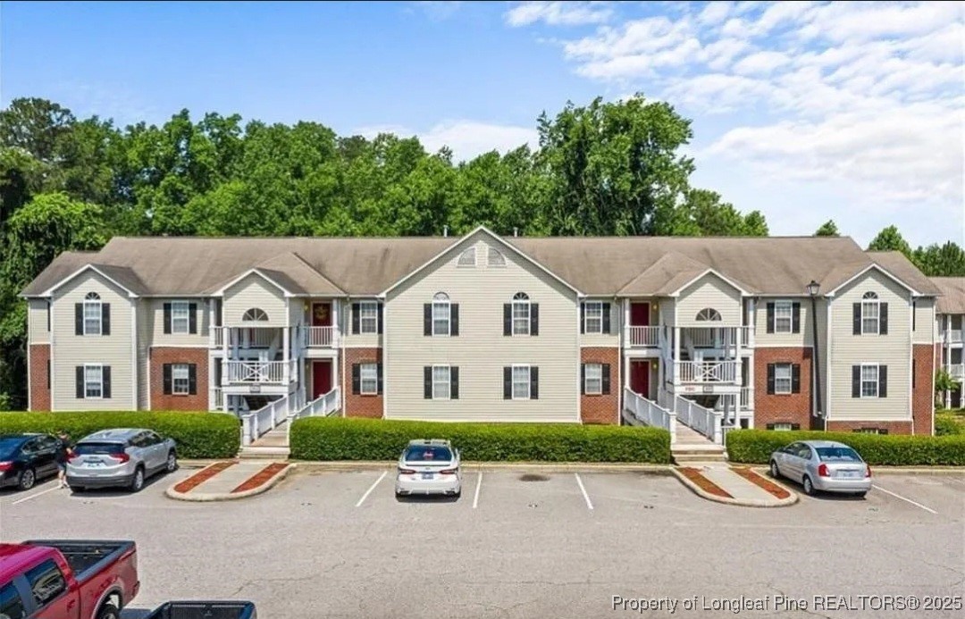 360 Bubble Creek Court, Unit 11 Fayetteville, NC 28311 - Photo 2 of 48 a view of multiple houses with a street
