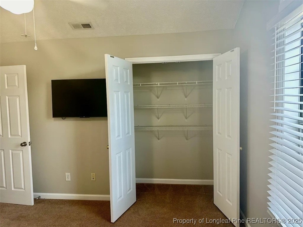 360 Bubble Creek Court, Unit 11 Fayetteville, NC 28311 - Photo 34 of 48 a view of walk in closet with window