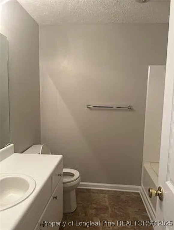 360 Bubble Creek Court, Unit 11 Fayetteville, NC 28311 - Photo 38 of 48 a bathroom with a sink and toilet