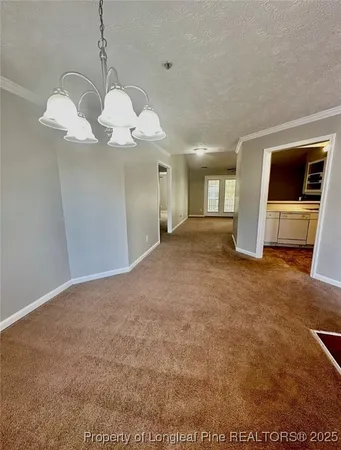a view of a livingroom with a chandelier