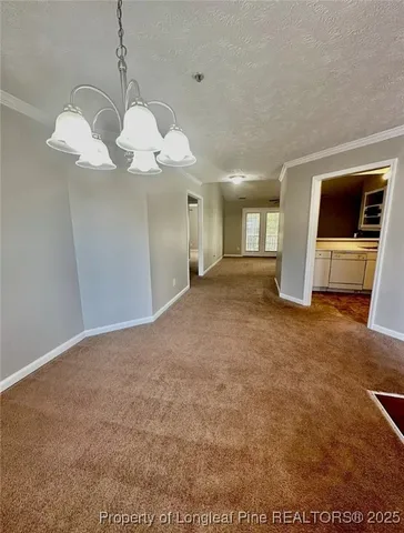 a view of a livingroom with a chandelier