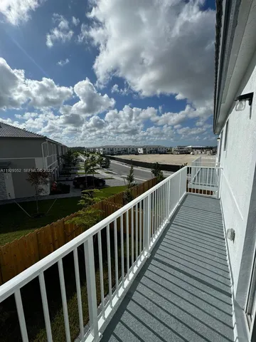 a kitchen with a sink stainless steel appliances and cabinets