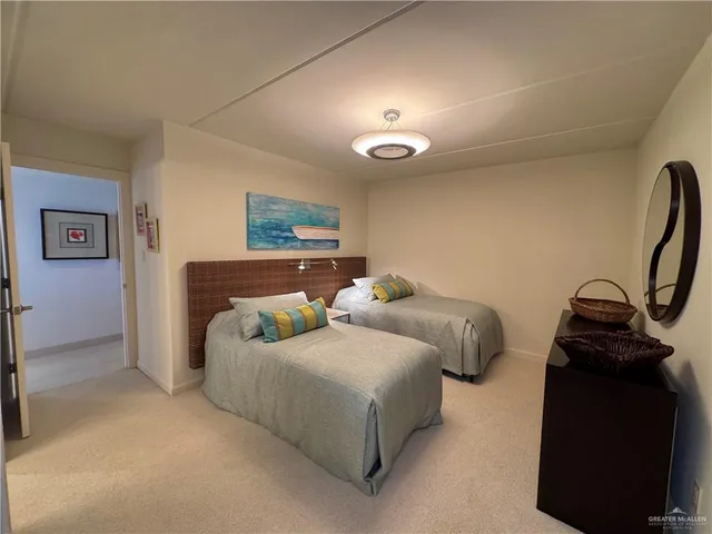 a bedroom with a bed and a walk in closet