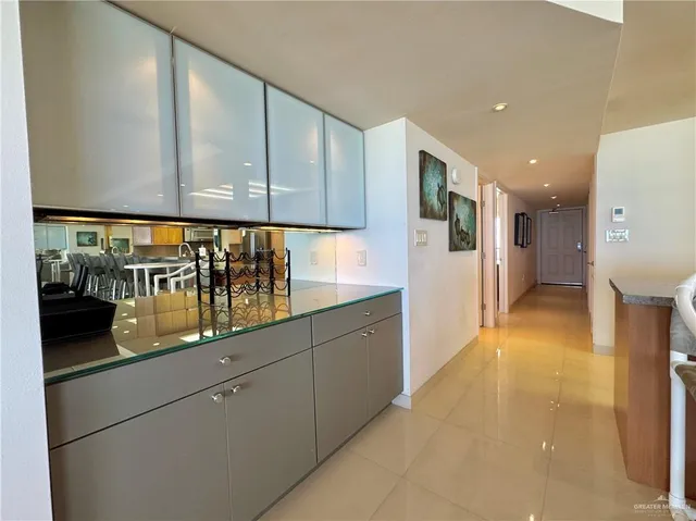 a bathroom with a sink and mirror
