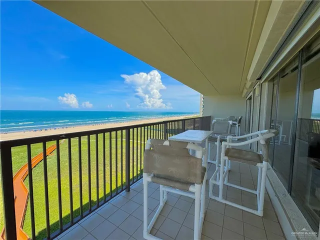 a view of balcony with furniture