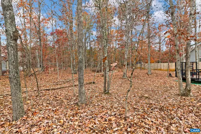 a view of a swimming pool with an outdoor space