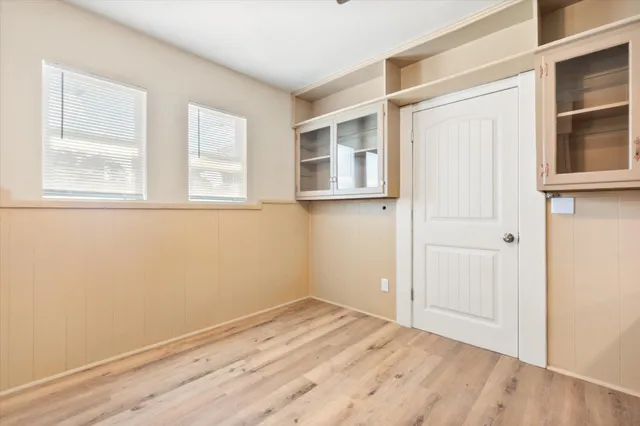 a view of empty room with windows