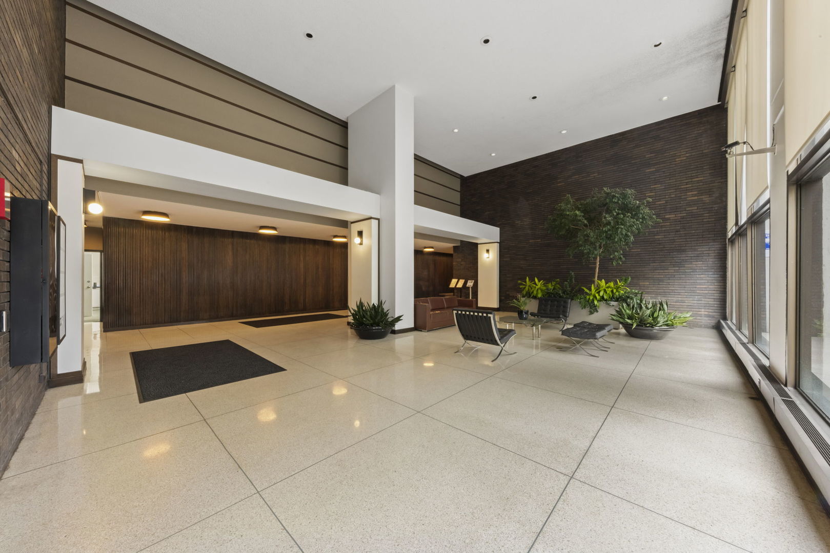 5455 North Sheridan Road, Unit 908 Chicago, IL 60640 - Photo 20 of 21 a view of a house with a patio