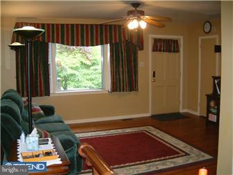 841 Valley View Road Media, PA 19063 - Photo 3 of 10 a room with furniture and a chandelier