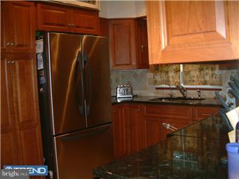 841 Valley View Road Media, PA 19063 - Photo 5 of 10 a kitchen with stainless steel appliances granite countertop a refrigerator and a sink