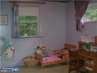 841 Valley View Road Media, PA 19063 - Photo 8 of 10 a bedroom with a bed and a window