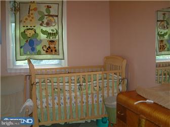 841 Valley View Road Media, PA 19063 - Photo 9 of 10 a room with a couch and a window
