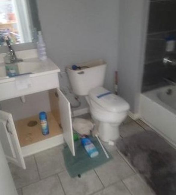 415 Thompson Street Ottawa, IL 61350 - Photo 9 of 10 a bathroom with a toilet and a sink