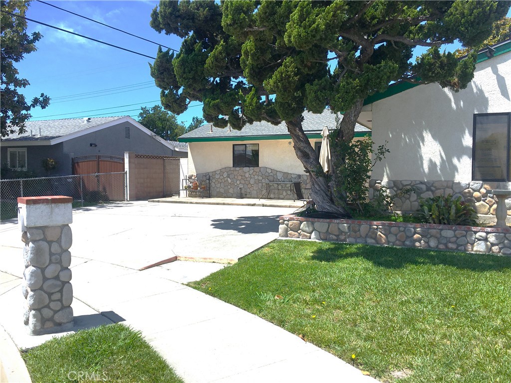 10011 Bernice Circle Buena Park, CA 90620 - Photo 2 of 28 a house view with a garden space
