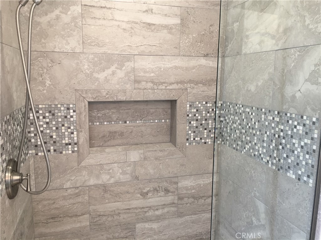 10011 Bernice Circle Buena Park, CA 90620 - Photo 10 of 28 a bathroom with a shower