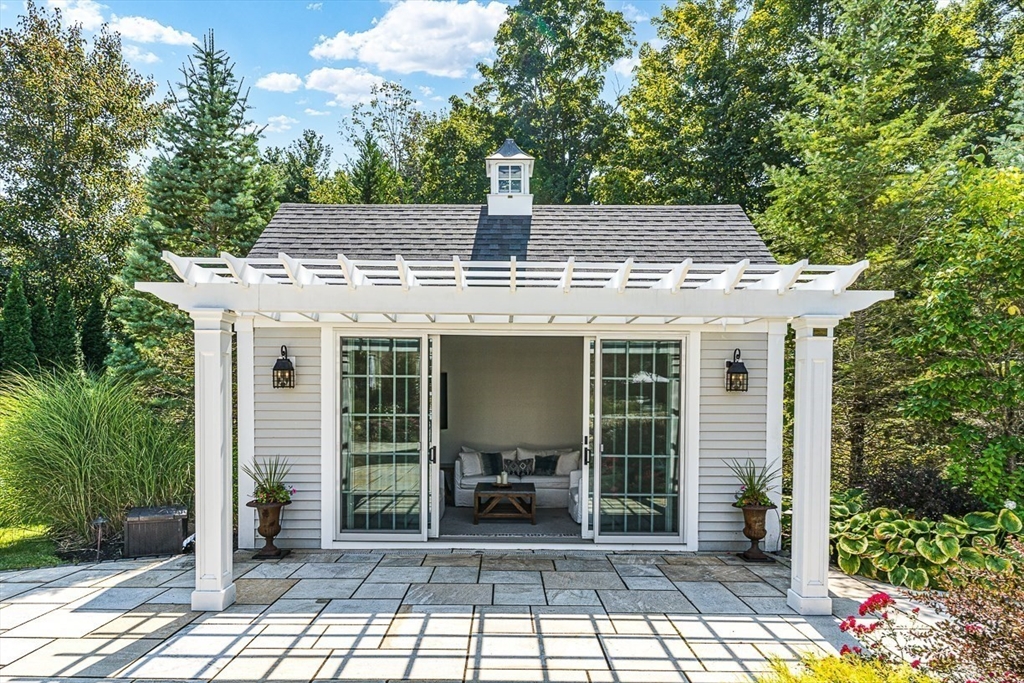 11 Village Lane Needham, MA 02492 - Photo 30 of 42 a view of a house with a porch
