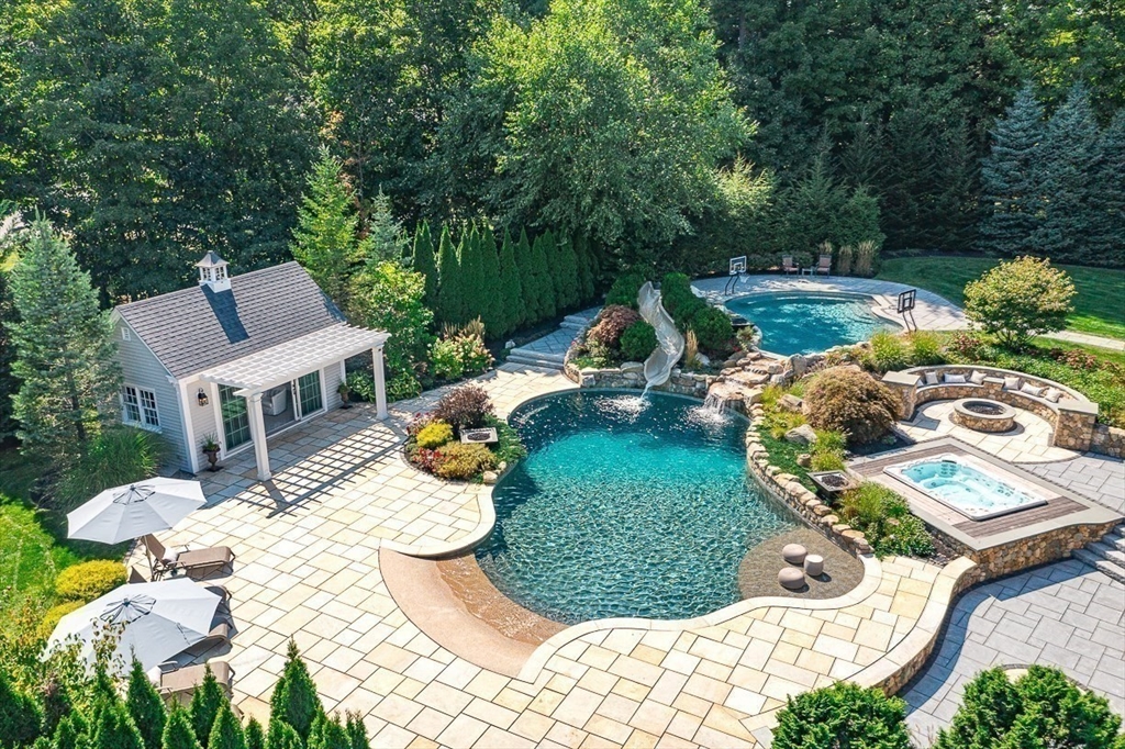 11 Village Lane Needham, MA 02492 - Photo 3 of 42 a view of a house with swimming pool and sitting area