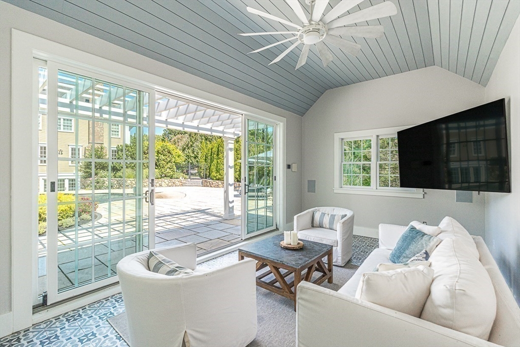 11 Village Lane Needham, MA 02492 - Photo 31 of 42 a living room with furniture and a window