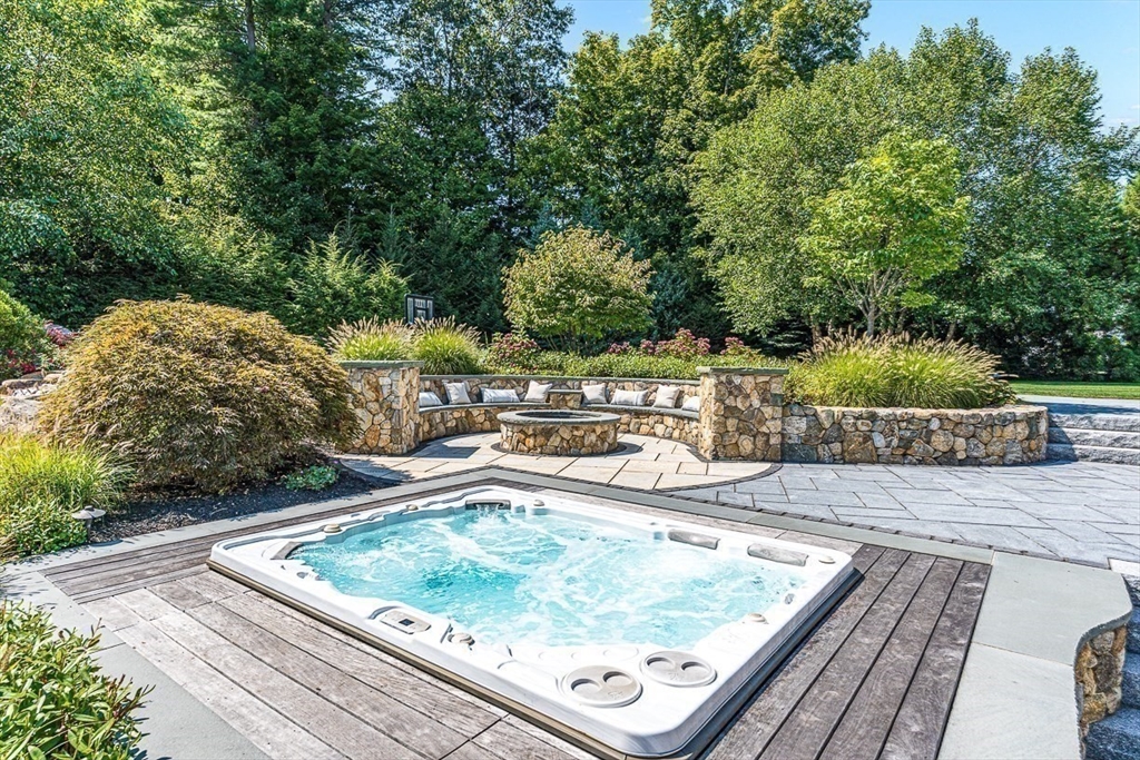 11 Village Lane Needham, MA 02492 - Photo 35 of 42 a view of a backyard with outdoor seating