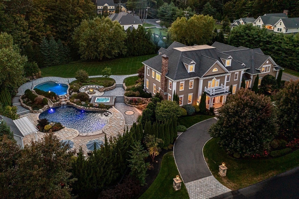 11 Village Lane Needham, MA 02492 - Photo 4 of 42 an aerial view of a house with garden space and lake view