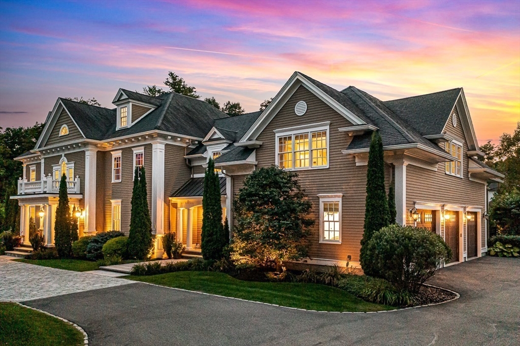 11 Village Lane Needham, MA 02492 - Photo 41 of 42 a front view of a house with garden