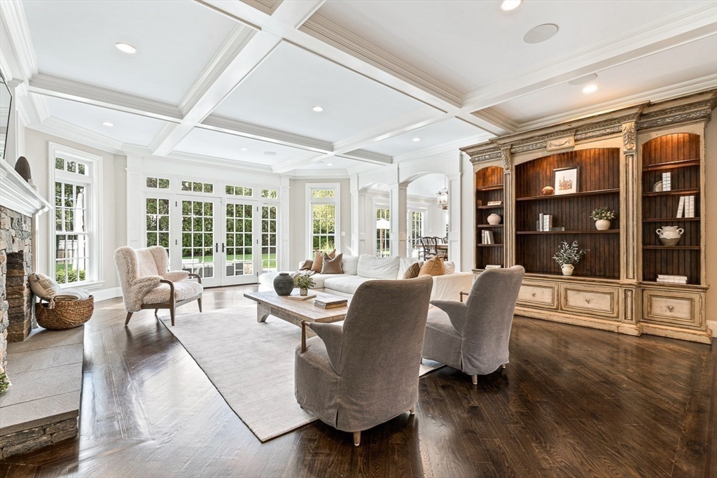 11 Village Lane Needham, MA 02492 - Photo 8 of 42 a living room with furniture and large windows