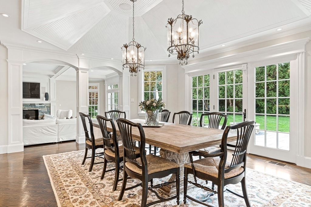 11 Village Lane Needham, MA 02492 - Photo 10 of 42 a view of a dining room with furniture window and wooden floor