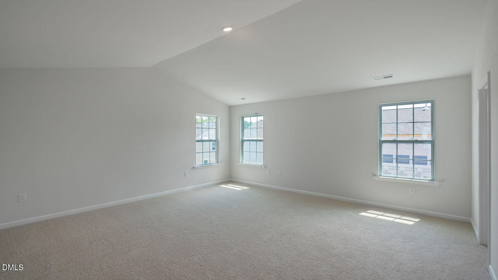 1261 Pavo Path Wendell, NC 27591 - Photo 15 of 40 an empty room with windows