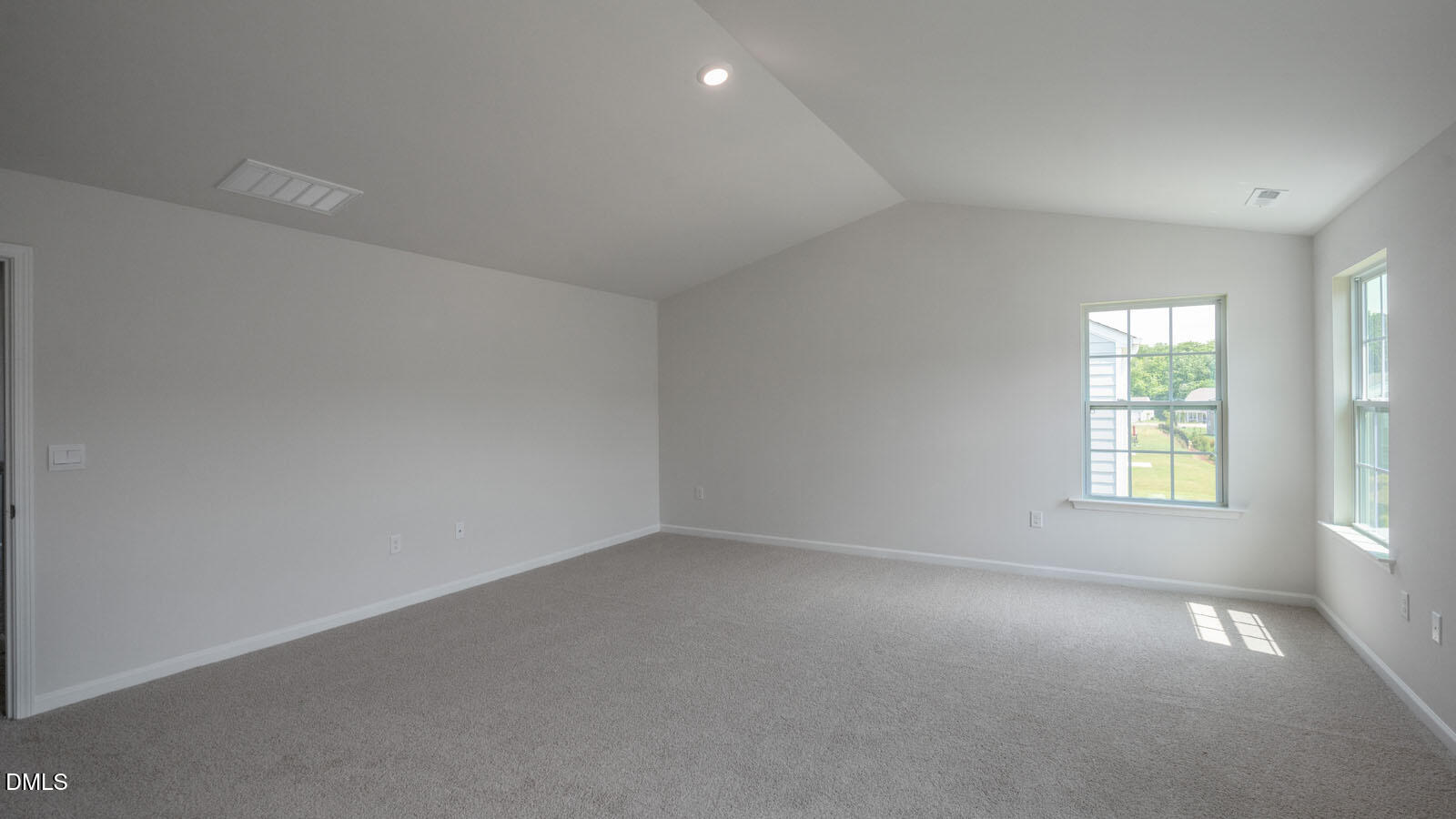 1261 Pavo Path Wendell, NC 27591 - Photo 20 of 40 an empty room with windows