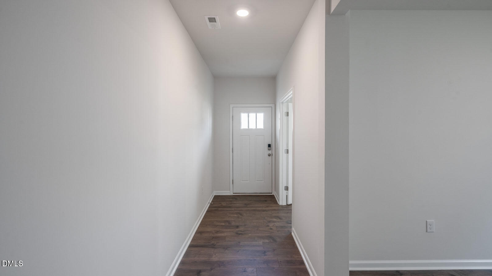 1261 Pavo Path Wendell, NC 27591 - Photo 2 of 40 a view of a hallway with wooden floor