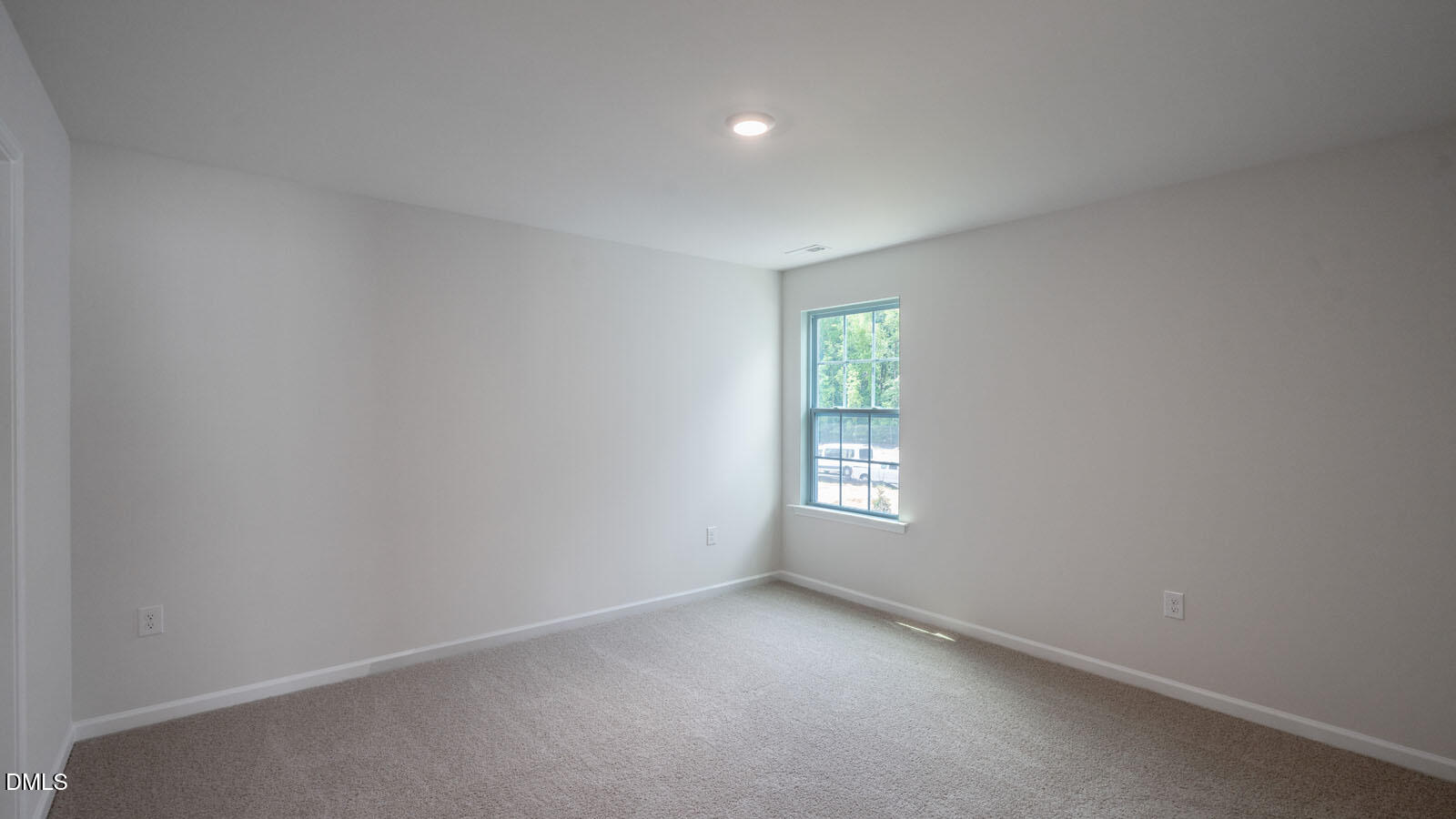 1261 Pavo Path Wendell, NC 27591 - Photo 23 of 40 a view of an empty room and a window