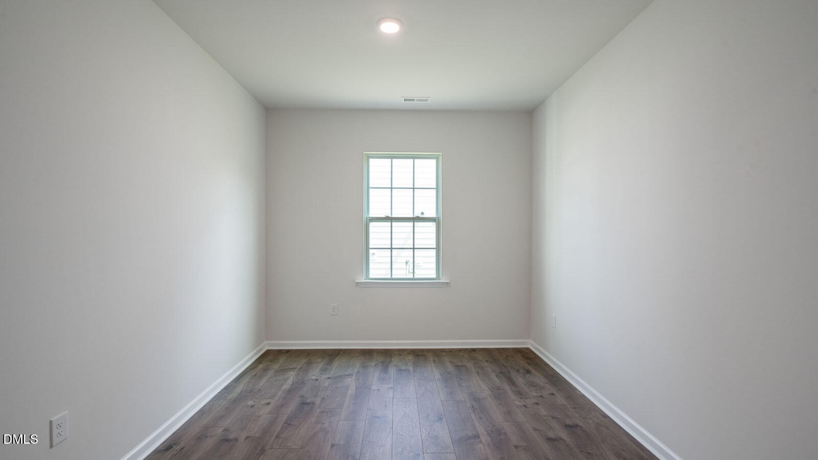 1261 Pavo Path Wendell, NC 27591 - Photo 6 of 40 an empty room with a window