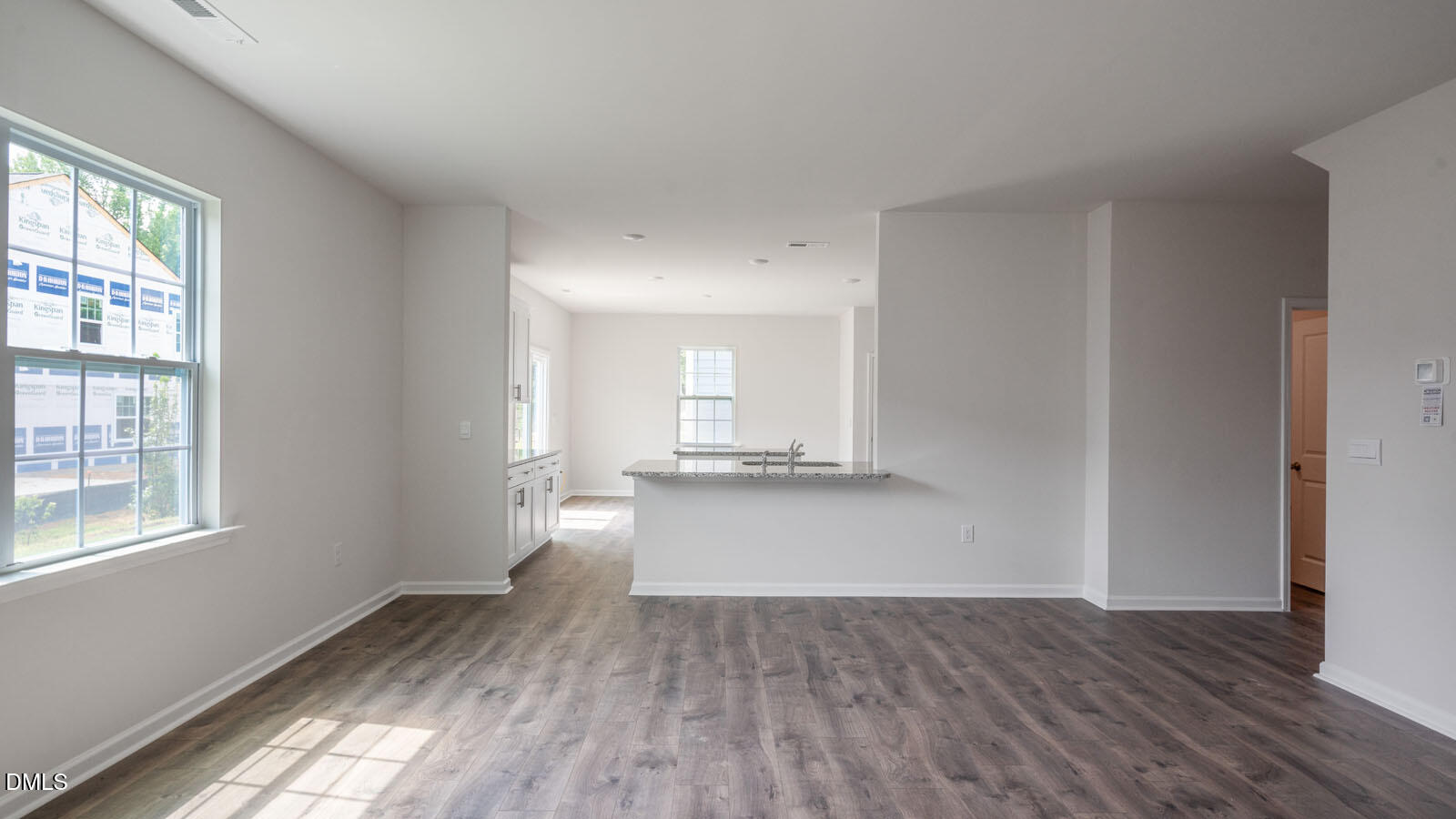 1261 Pavo Path Wendell, NC 27591 - Photo 8 of 40 a view of empty room with wooden floor and fan