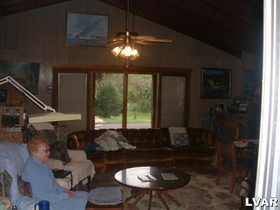 786 Andrews Road Bath, PA 18014 - Photo 6 of 8 a living room with furniture and a large window