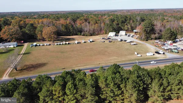 a view of a town with mountains in the background