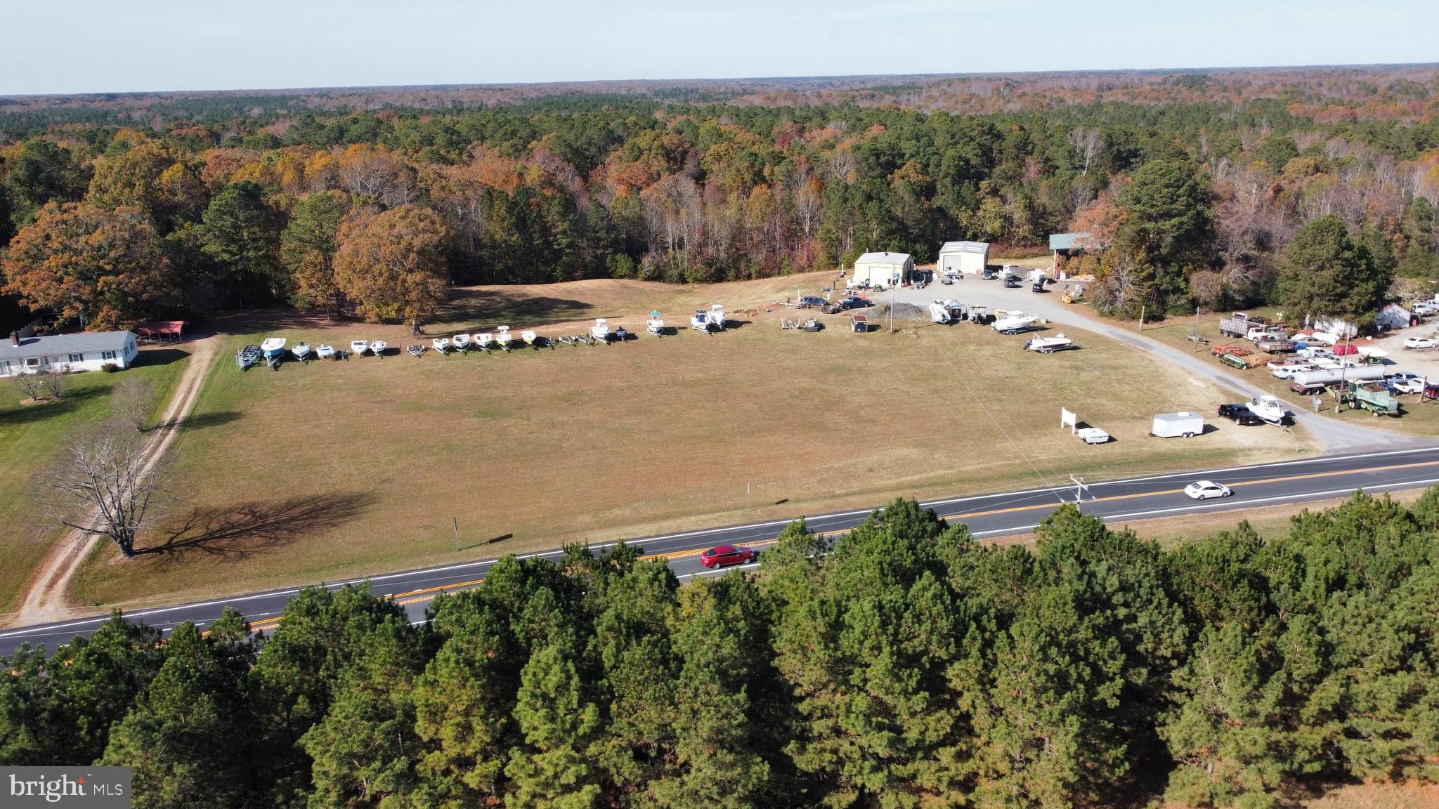 1740 Irvington Road Weems, VA 22576 - Photo 3 of 13 a view of a town with mountains in the background