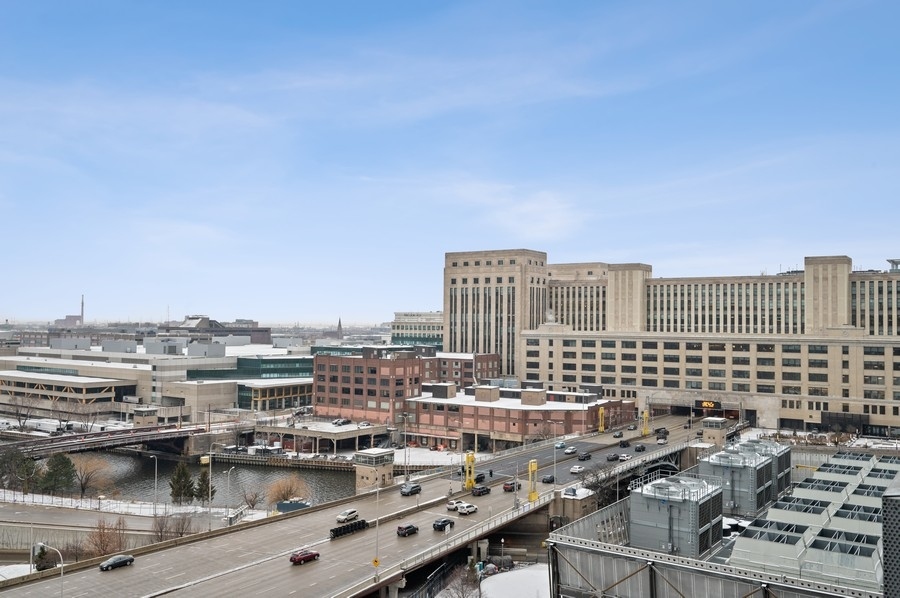 235 West Van Buren Street, Unit 1506 Chicago, IL 60607 - Photo 14 of 16 a view of a city with tall buildings