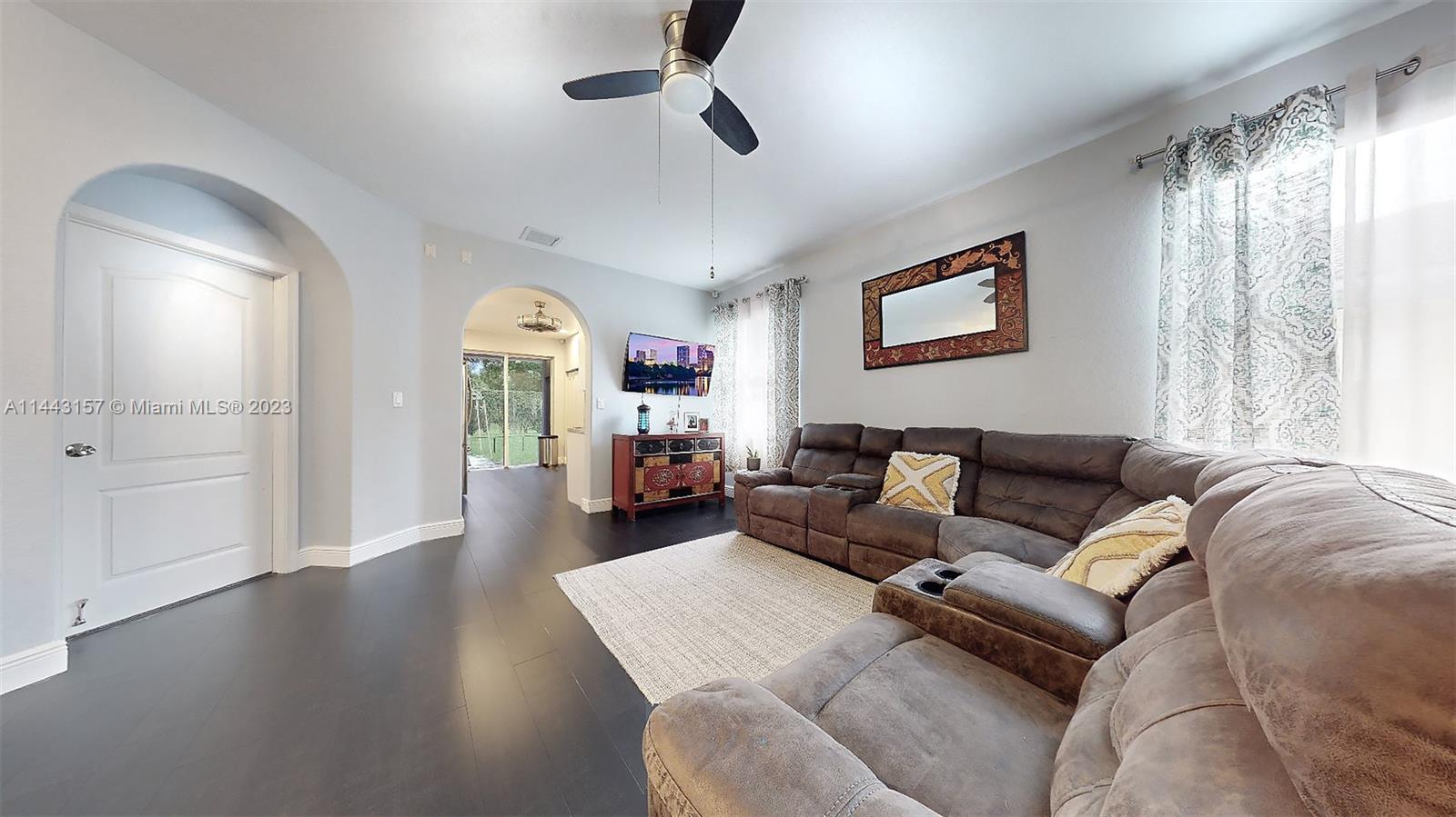 2231 Northeast 37th Road Homestead, FL 33033 - Photo 13 of 49 a living room with furniture and a large window