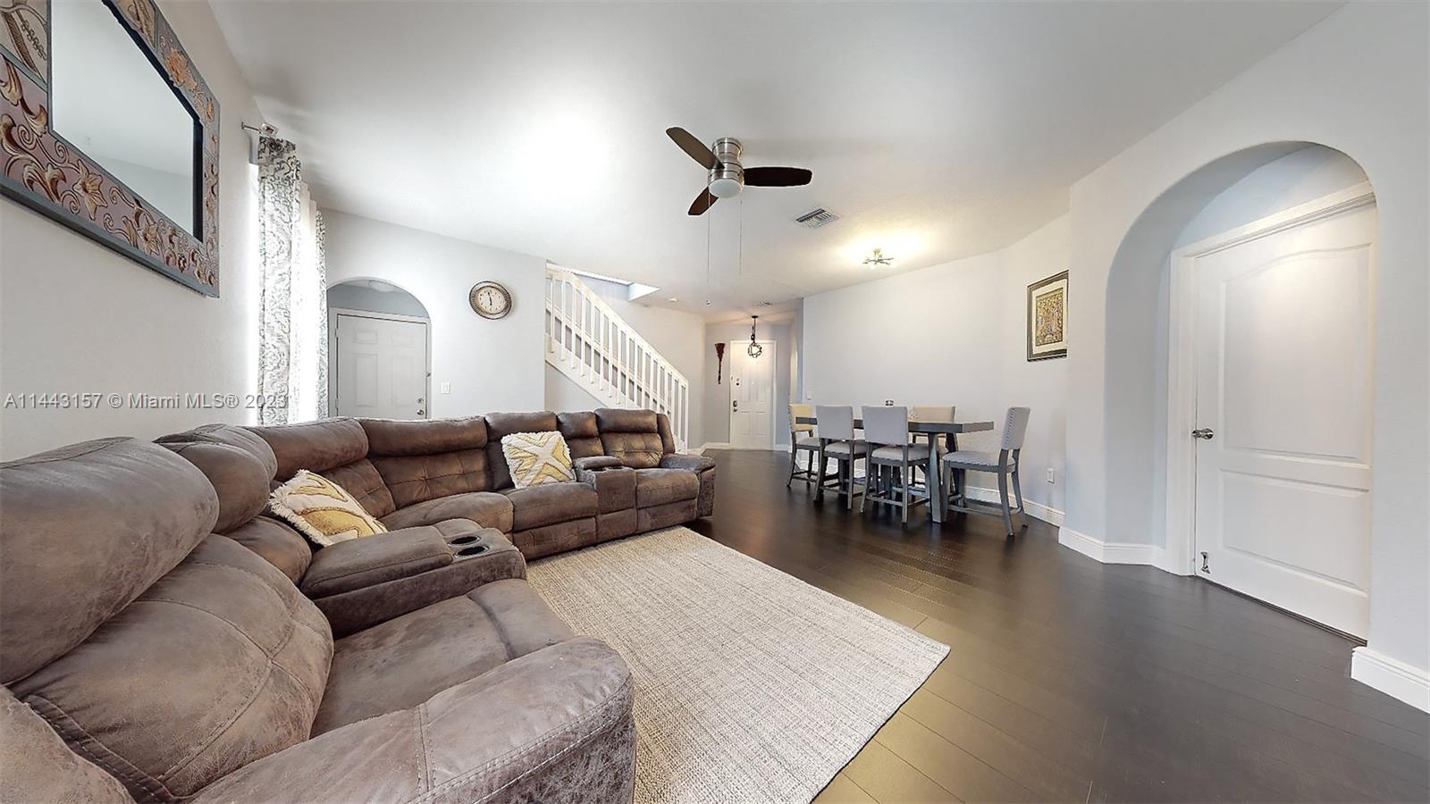 2231 Northeast 37th Road Homestead, FL 33033 - Photo 14 of 49 a living room with furniture and a large window