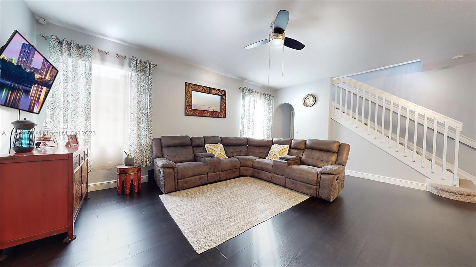 2231 Northeast 37th Road Homestead, FL 33033 - Photo 16 of 49 a living room with furniture and a flat screen tv