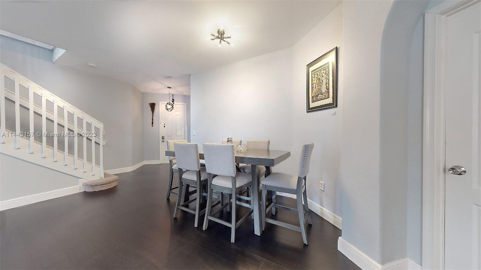 2231 Northeast 37th Road Homestead, FL 33033 - Photo 18 of 49 a view of a dining room with furniture and wooden floor