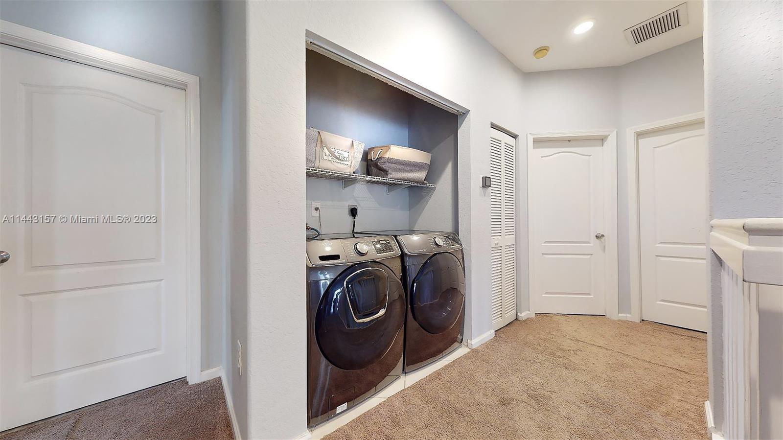 2231 Northeast 37th Road Homestead, FL 33033 - Photo 33 of 49 a view of a storage & utility room with washer and dryer