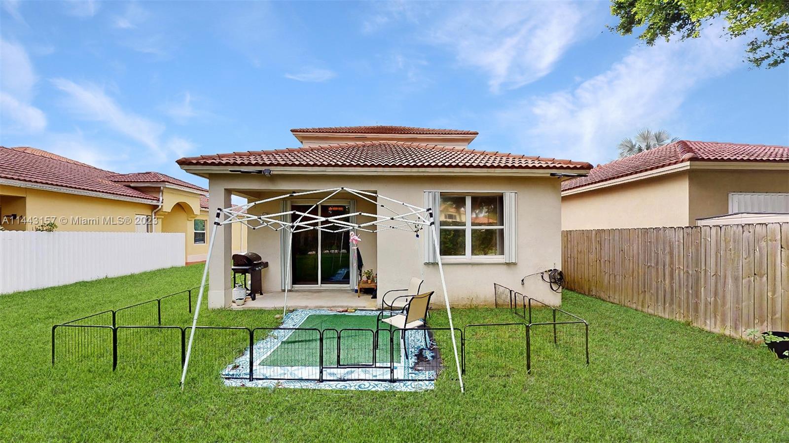2231 Northeast 37th Road Homestead, FL 33033 - Photo 4 of 49 a view of an house with backyard space and porch