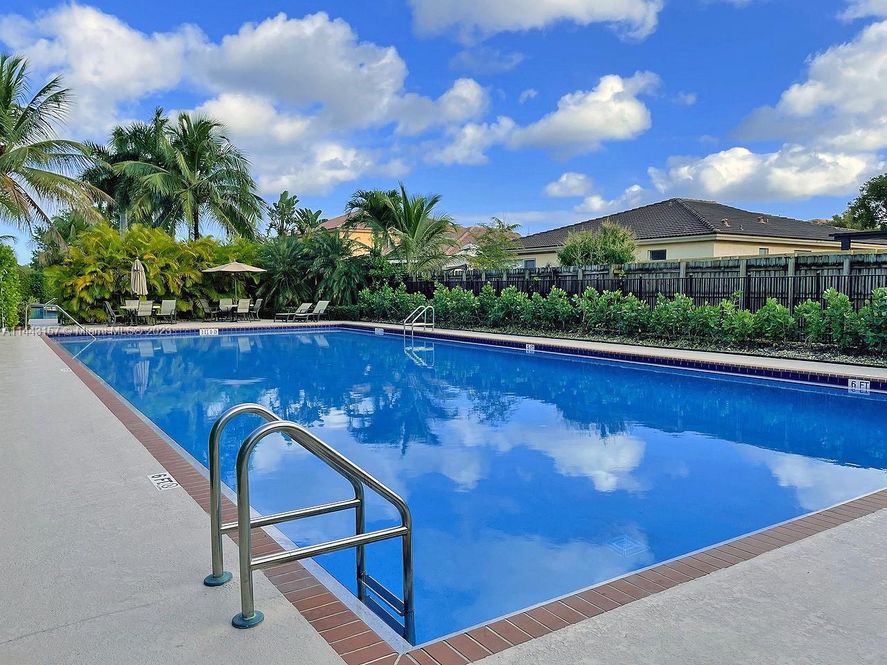 2231 Northeast 37th Road Homestead, FL 33033 - Photo 43 of 49 a view of a swimming pool with a patio