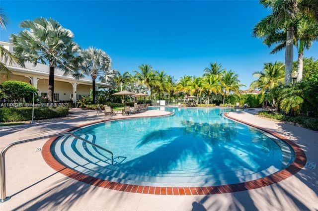 2231 Northeast 37th Road Homestead, FL 33033 - Photo 44 of 49 a view of a swimming pool with a patio