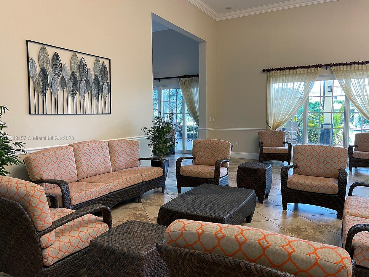 2231 Northeast 37th Road Homestead, FL 33033 - Photo 48 of 49 a living room with furniture and a large window