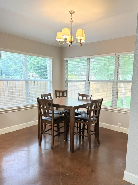2224 Kerr Trail Cedar Park, TX 78613 - Photo 8 of 15 a view of a dining room with furniture window and outside view