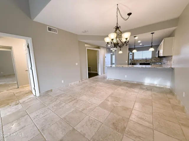 a view of a chandelier in a room