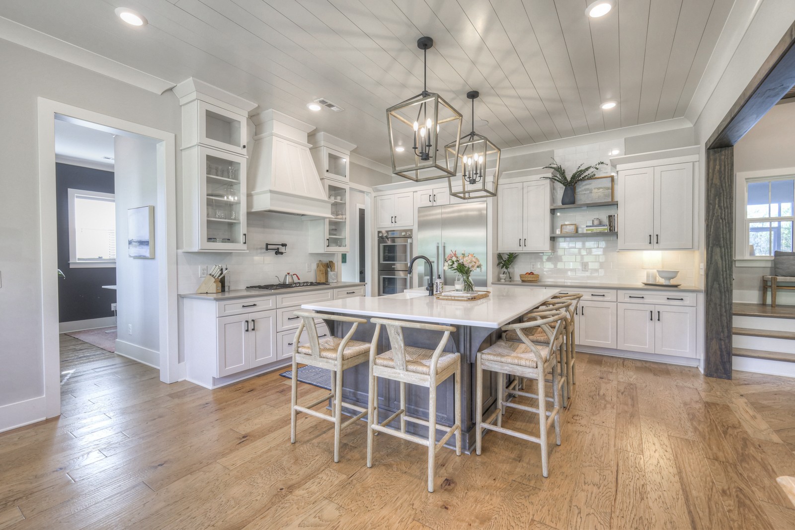 6929 Cross Keys Road College Grove, TN 37046 - Photo 13 of 72 a kitchen with stainless steel appliances kitchen island granite countertop a table and chairs in it